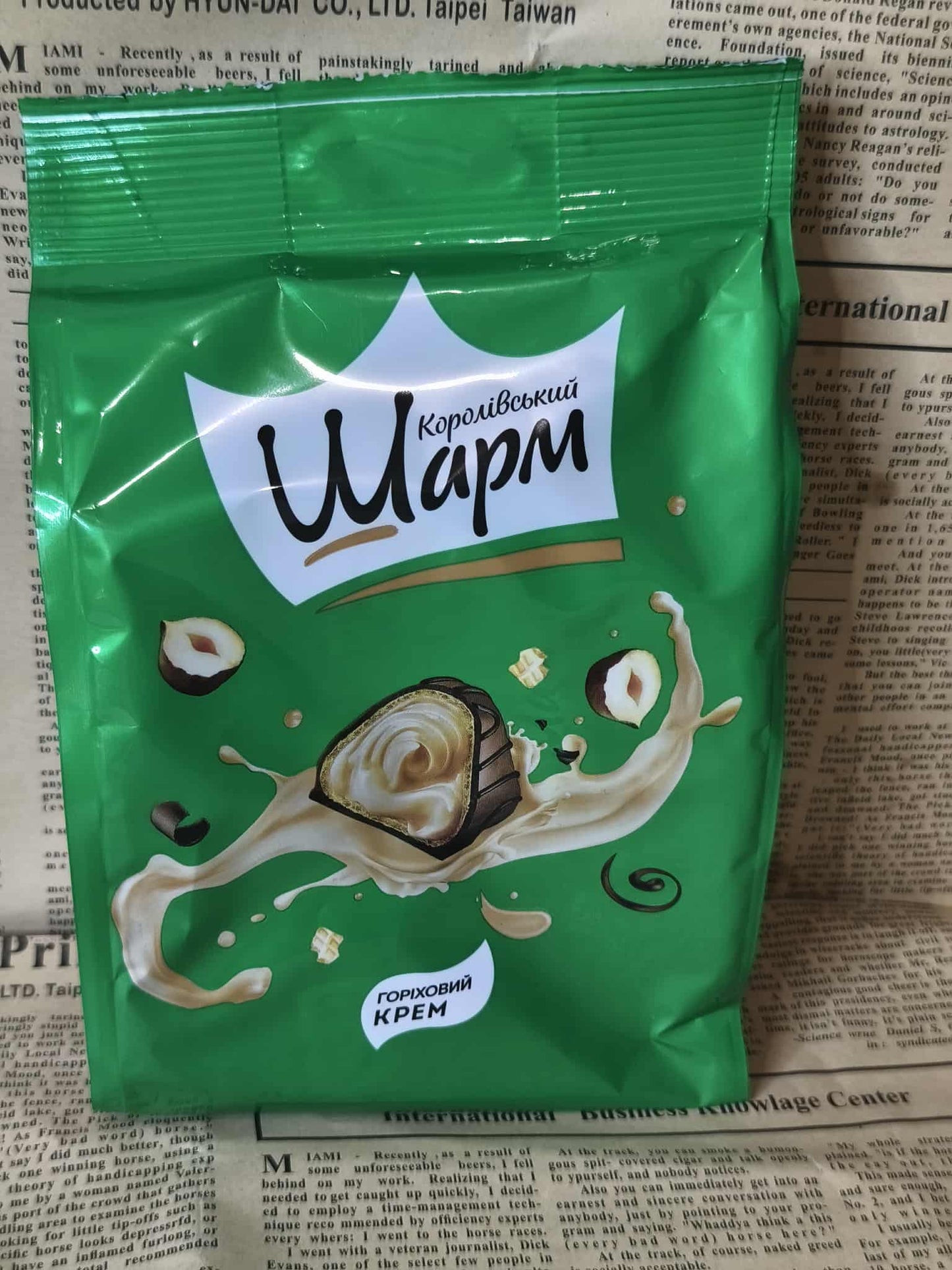 Цукерки - Королівський шарм, з горіховою начинкою, ABK, 113 г Ціна не включає 20%  обов'язкового пожертвування на Парасольку. Пожертвування потрібно додати під час оформлення замовлення. Дякуємо за вашу підтримку!